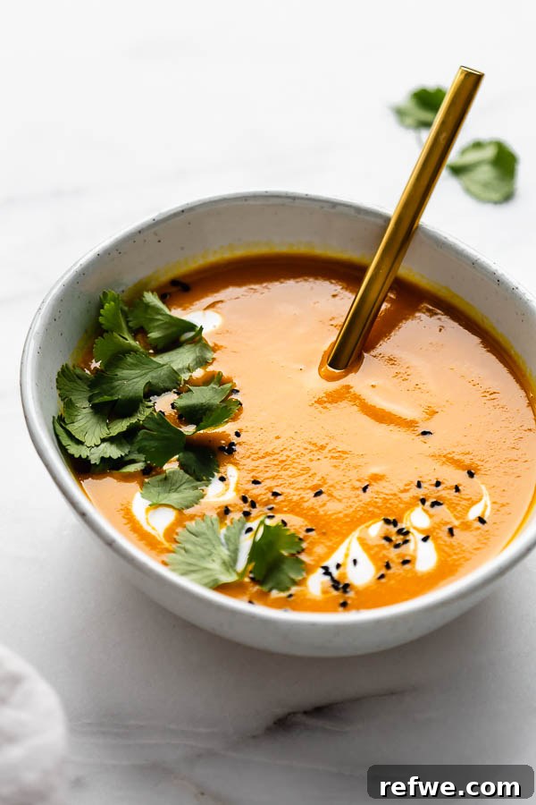 Creamy Thai carrot ginger soup in a bowl