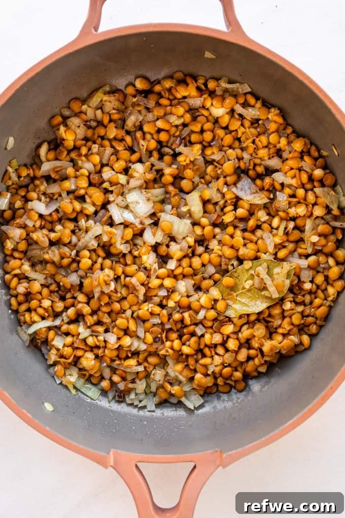lentils and onions in a pan