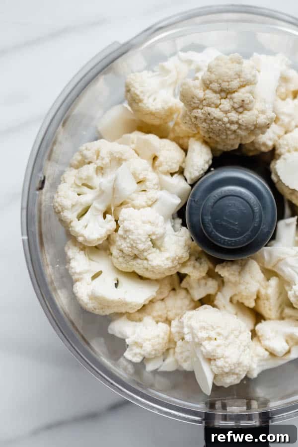 Wholesome Vegan Cauliflower Fried Rice 3 Preparation of cauliflower rice for a burrito bowl