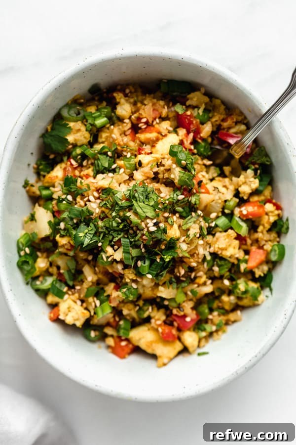 Wholesome Vegan Cauliflower Fried Rice 7 Close-up of a serving of vegan cauliflower fried rice