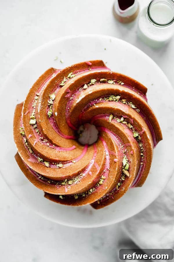 Ruby Glazed Orange Cardamom Bundt 6 A freshly baked orange cardamom bundt cake cooling on a wire rack, ready for its exquisite blood orange glaze.