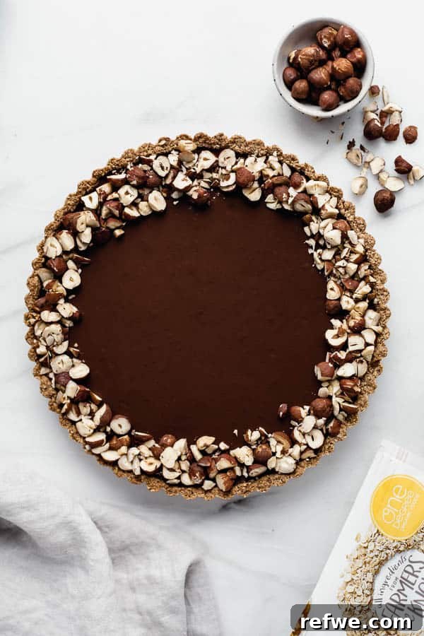 Decadent Vegan Chocolate Hazelnut Tart 3 Vegan chocolate hazelnut tart, sliced