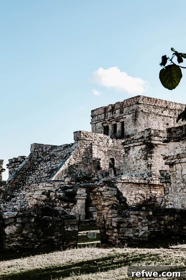 Tulum's Gastronomic Gems: A Foodie's Journey 7 The iconic El Castillo pyramid at the Tulum Ruins overlooking the Caribbean Sea