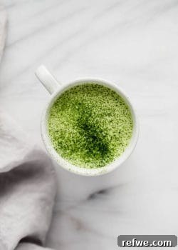 A beautifully prepared Vanilla Macadamia Matcha Latte, ready to be enjoyed.