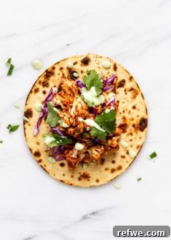 Cauliflower tinga tacos arranged with fresh toppings