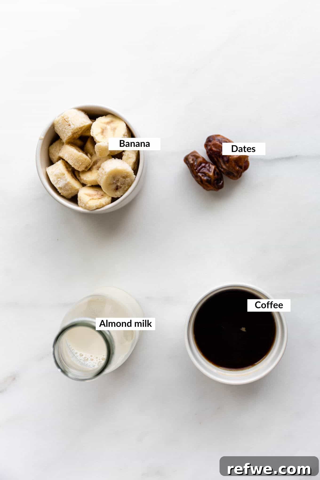 Banana Java Blend 3 Assortment of fresh ingredients for a coffee smoothie, including bananas, coffee, milk, and dates