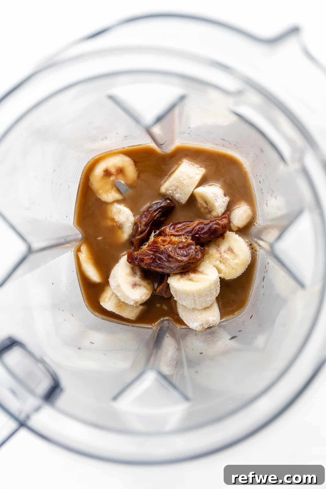 Banana Java Blend 4 Frozen bananas, pitted dates, chilled coffee, and almond milk ready to be added to a high-speed blender