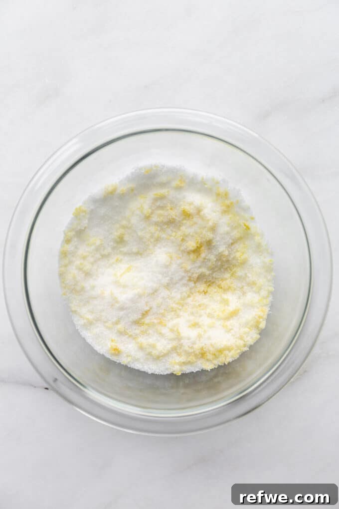 Wholesome Lemon Poppy Seed Delights 4 A bowl showing granulated sugar mixed with finely grated lemon zest.