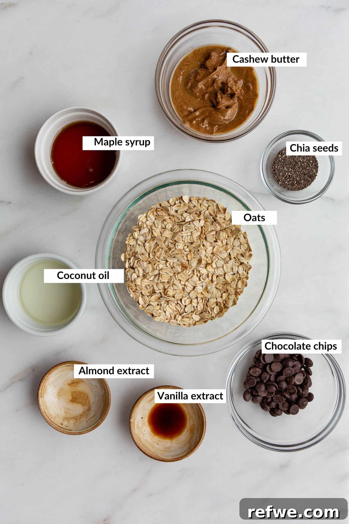 Chocolate Chip Cookie Crunch Granola 3 Essential ingredients for crafting homemade cookie dough granola laid out on a clean surface.