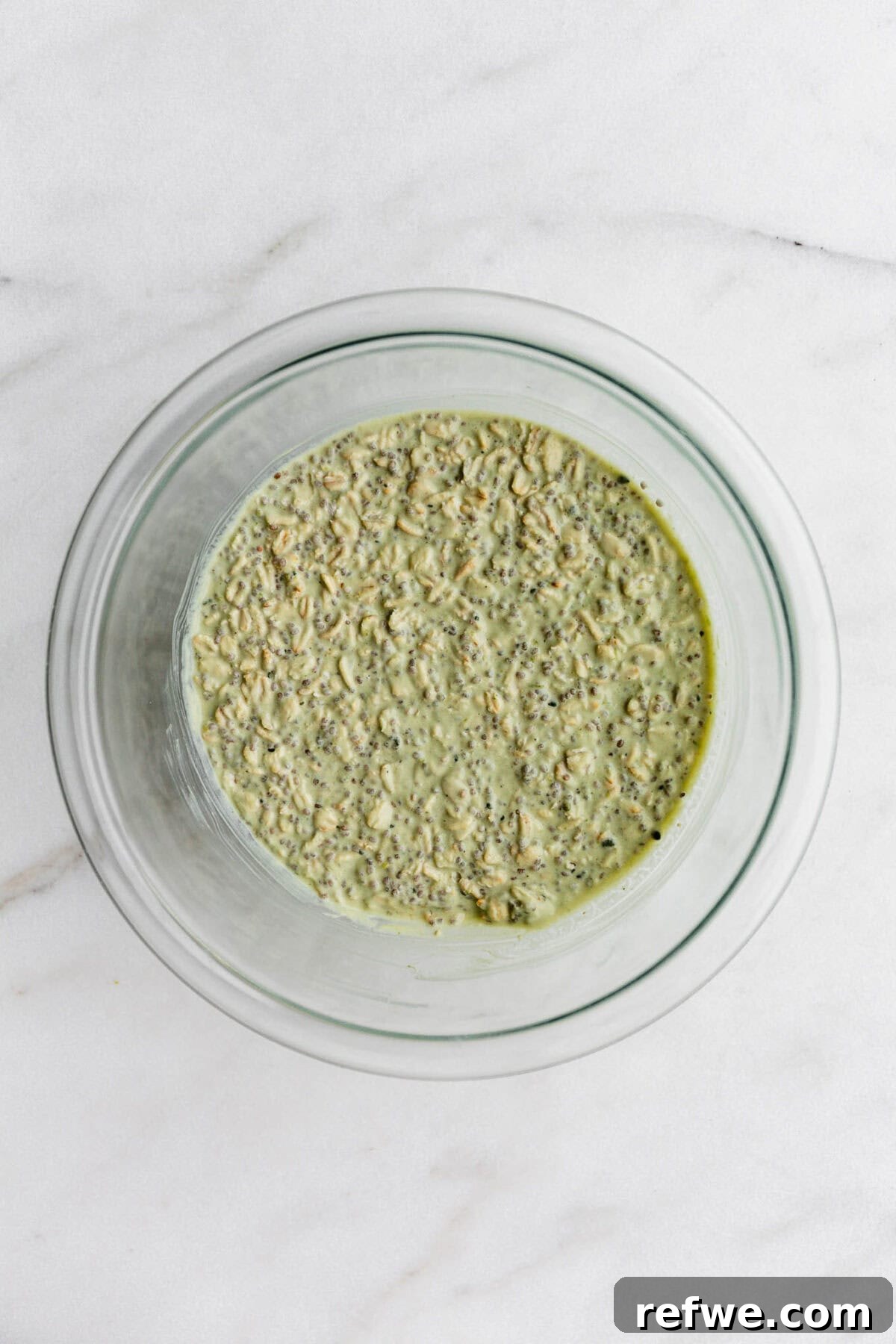 Key Lime Pie Overnight Oats Recipe for Creamy Citrus Breakfast 7 Key lime overnight oats in a clear bowl.