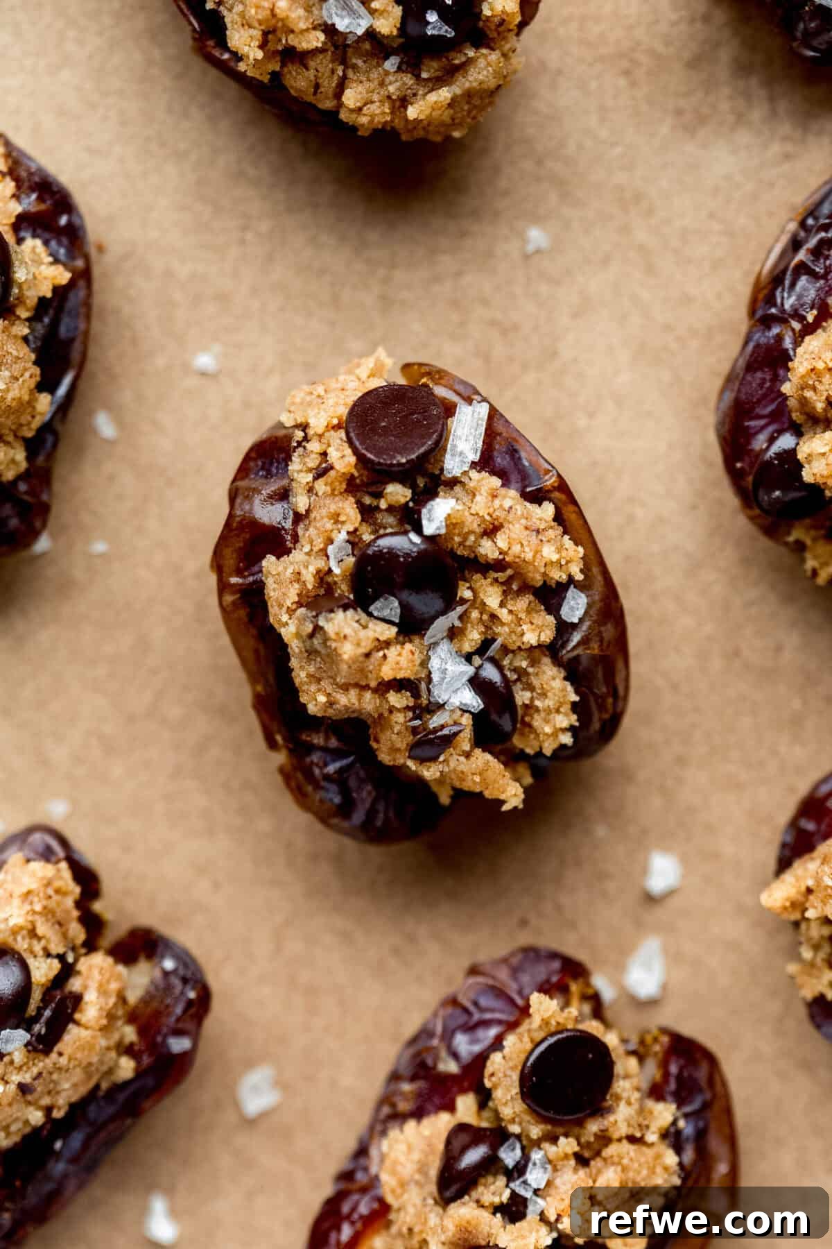 Cookie Dough-Stuffed Dates: Sweet Appetizer with Chocolate Chips 9 cookie dough stuffed dates topped with chocolate chips and sea salt.