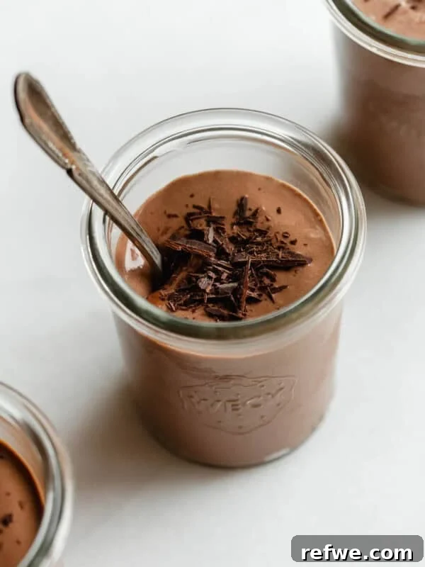 Chewy Rice Paper Mochi Recipe: Step-by-Step Homemade Treat 13 Greek yogurt chocolate mousse served in glass jars topped with chocolate shavings and a spoon.