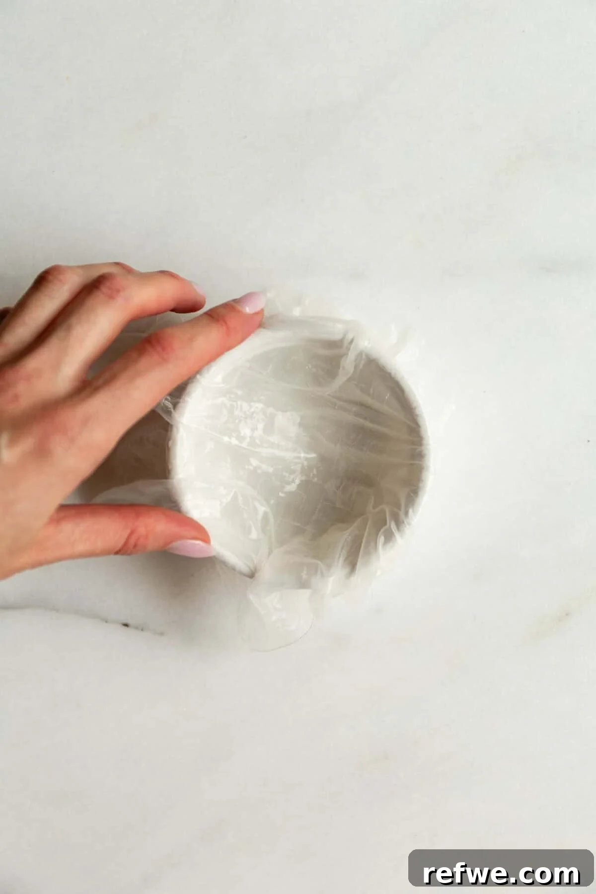 Chewy Rice Paper Mochi Recipe: Step-by-Step Homemade Treat 5 Hand shaping a rice paper mochi ball