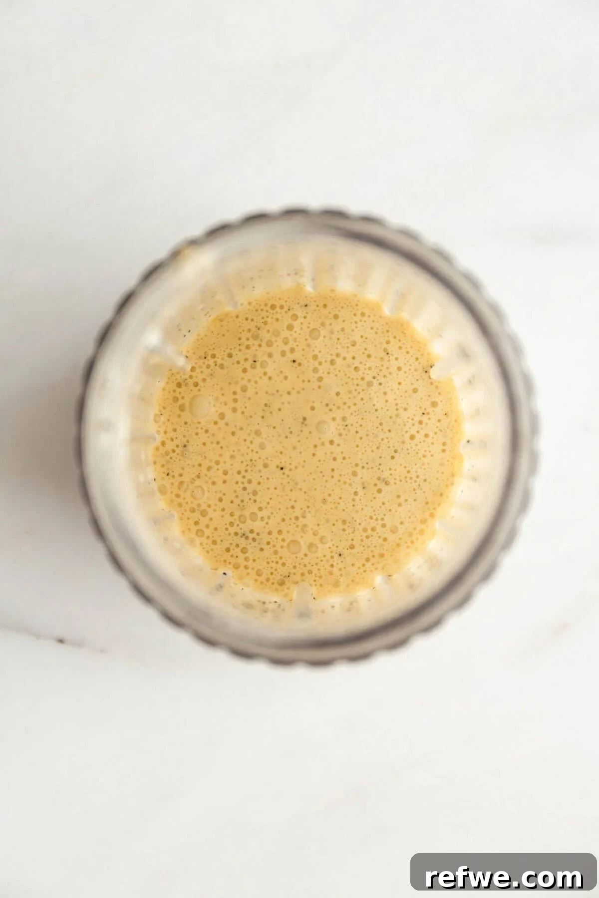 Creamy Passionfruit Chia Pudding Recipe for Breakfast & Dessert 6 Glass jar of passionfruit chia pudding mixture