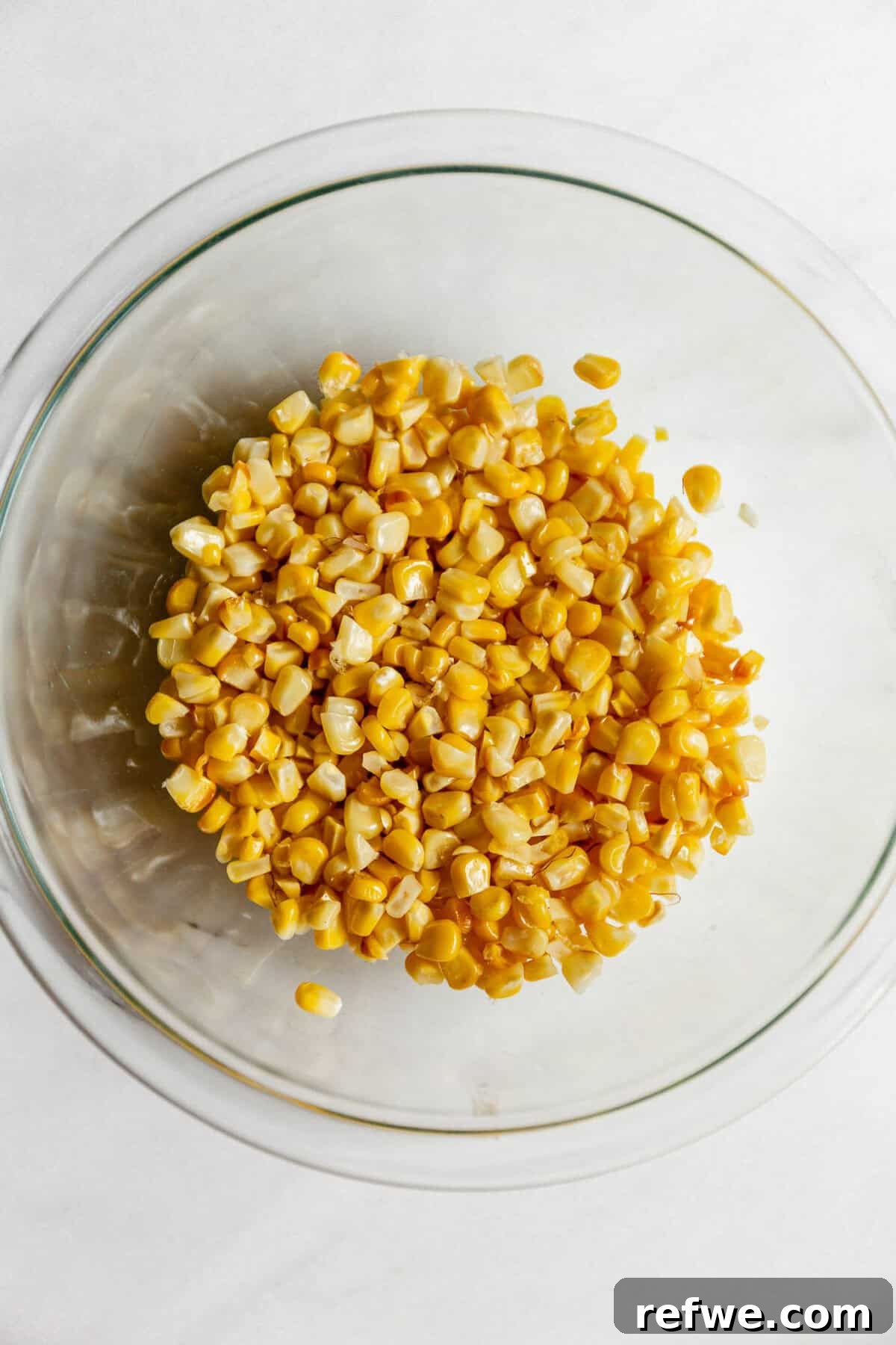 corn kernels in a clear bowl.