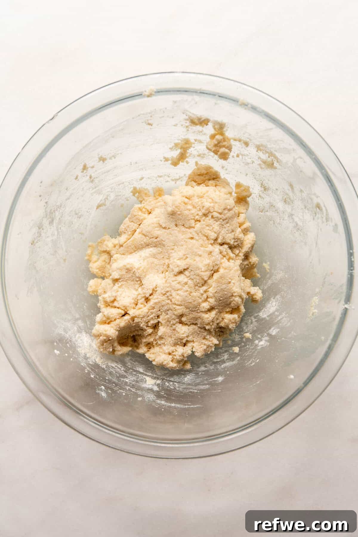 Cottage Cheese and Almond Flour Bagel Recipe 7 Cottage Cheese Almond Flour Bagel dough in a clear mixing bowl.
