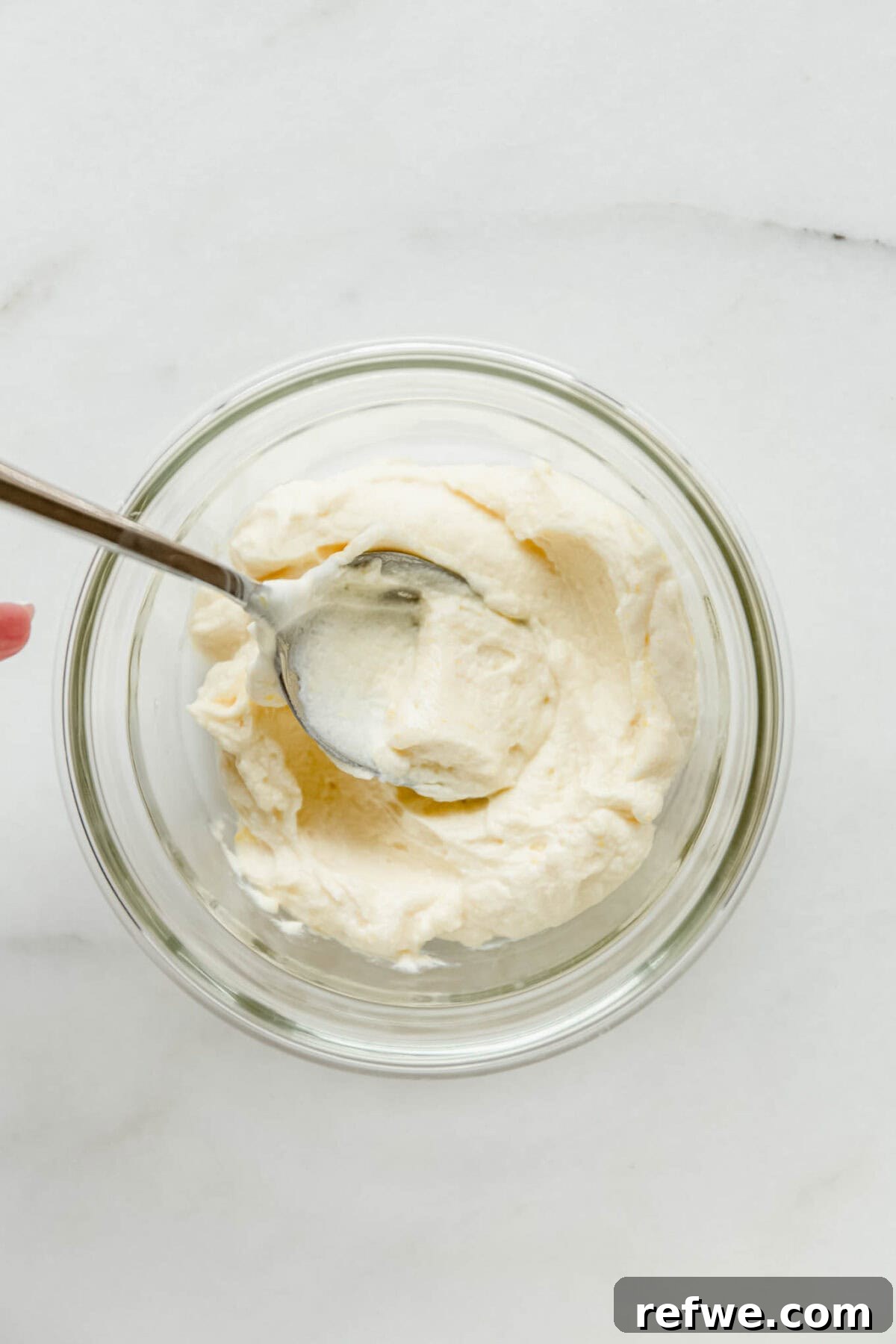 Mini Strawberry Cheesecake Pudding Jars 5 vanilla greek yogurt pudding in a clear container.