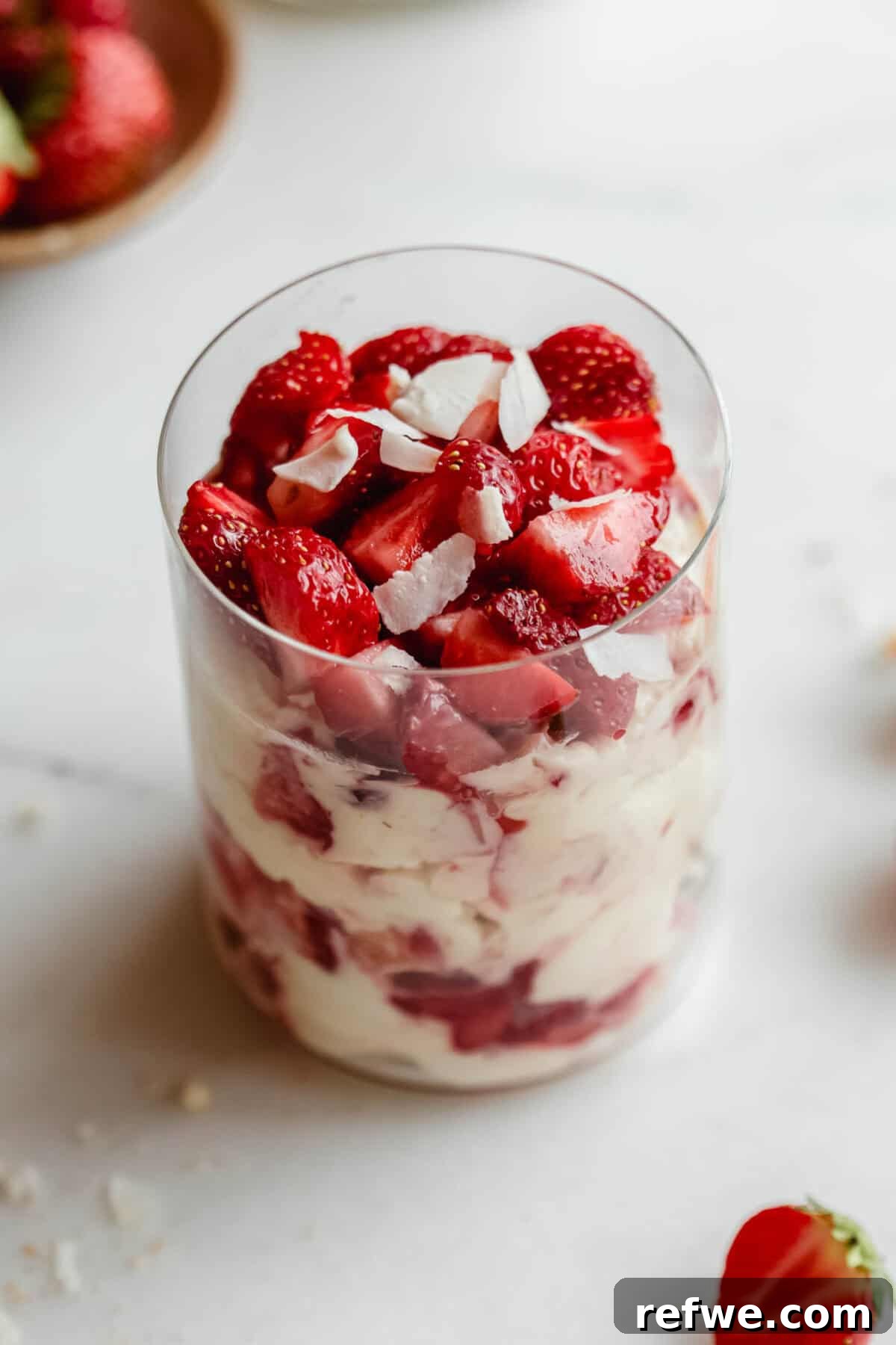 Mini Strawberry Cheesecake Pudding Jars 8 Strawberry pudding jar made with Greek yogurt, Nilla wafers, and vanilla pudding mix.