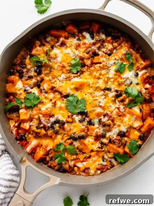 Buffalo Chicken Zucchini Roll-Ups Recipe 14 ground turkey sweet potato skillet topped with melted cheese and cilantro.