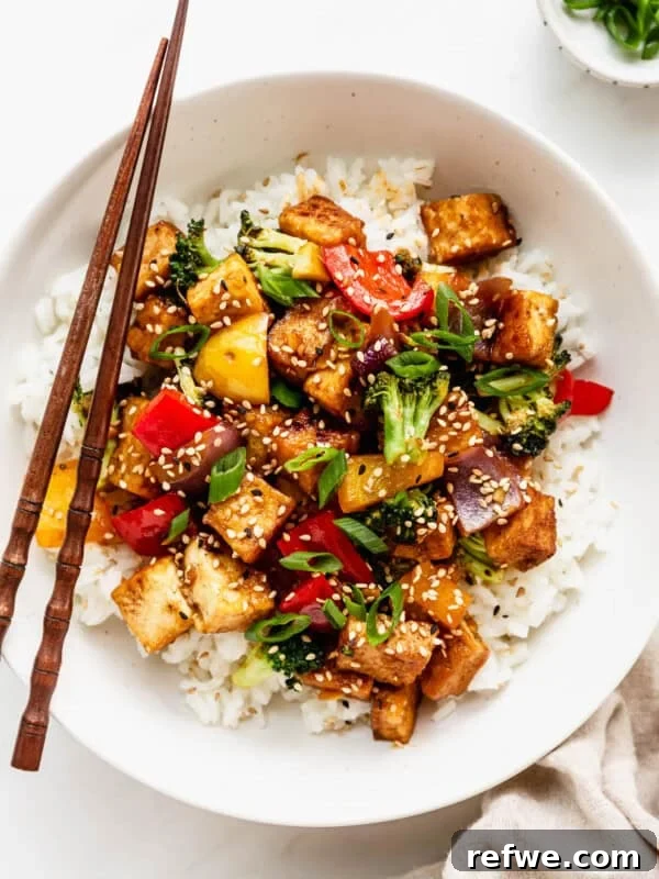 Buffalo Chicken Zucchini Roll-Ups Recipe 16 a bowl of tofu stir fry with veggies served over rice