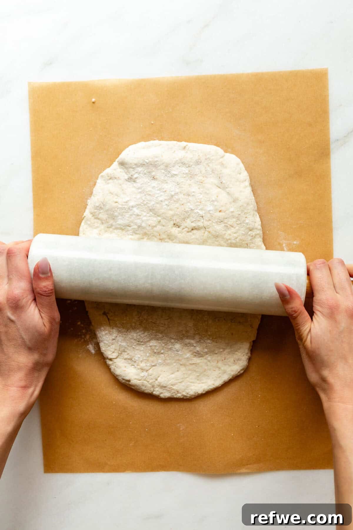 Homemade Cottage Cheese Pop Tarts Recipe 7 Rolling out cottage cheese cinnamon roll dough with a rolling pin.