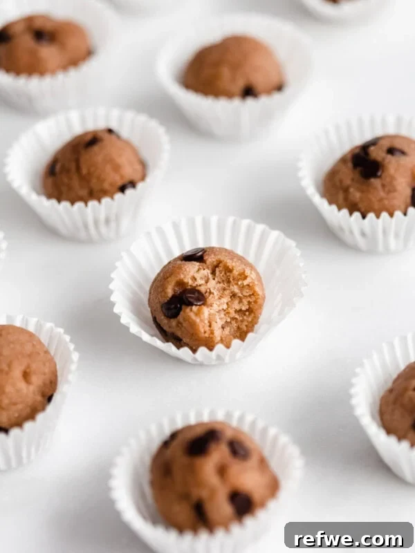 Creamy Greek Yogurt Peanut Butter Mousse Recipe 8 Chocolate chip cookie dough ball with a bite taken out of it