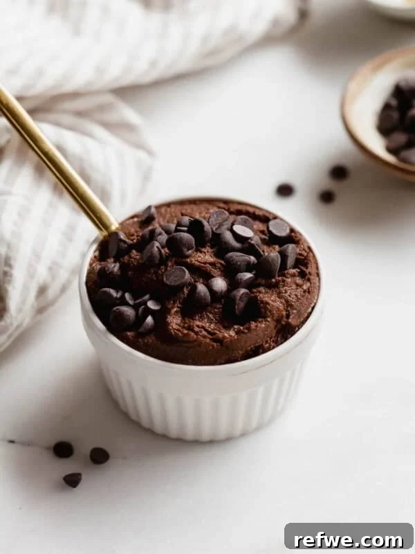 Baked Cottage Cheese Donut Holes Recipe 14 Delicious chocolate chia pudding topped with chocolate chips in a white ramekin.