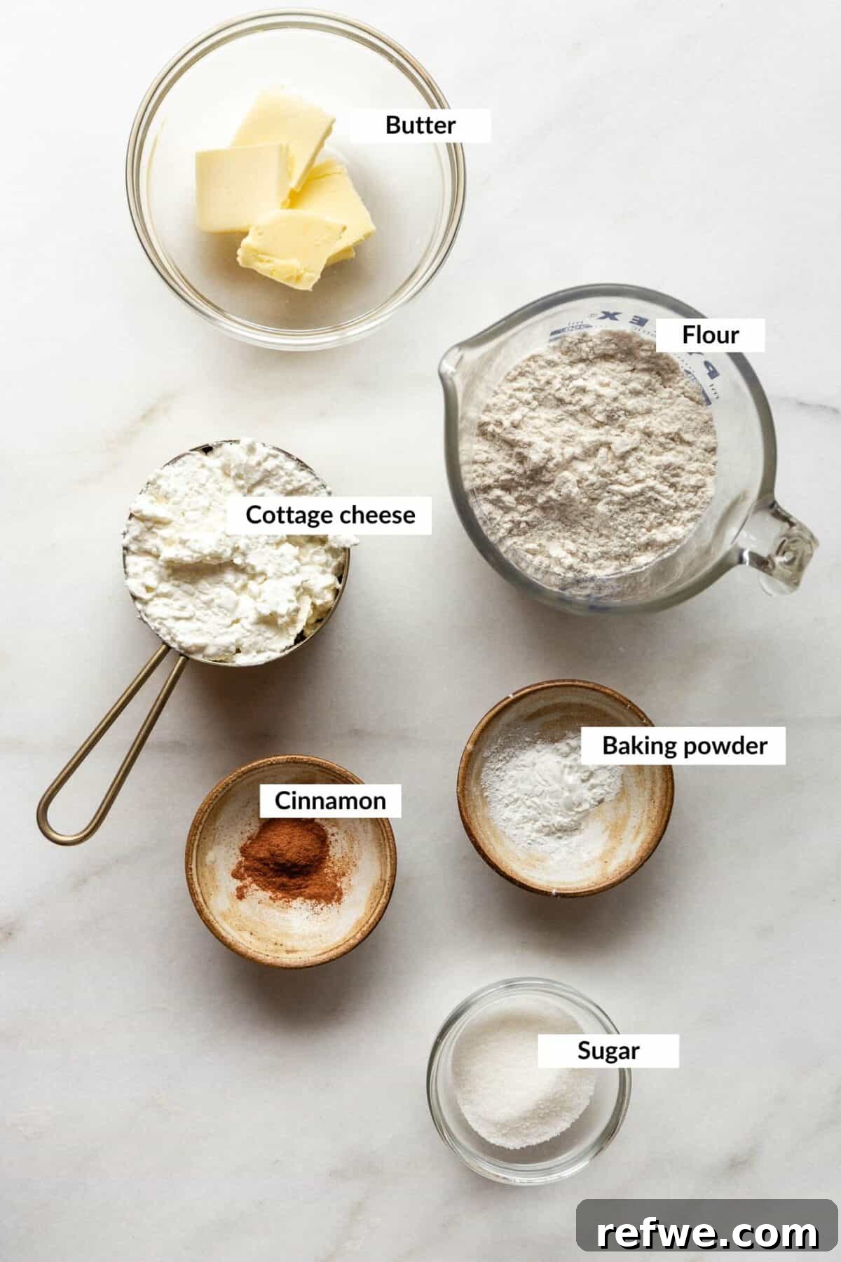 Baked Cottage Cheese Donut Holes Recipe 3 Bowls of butter, flour, cottage cheese, baking powder, cinnamon, and sugar labeled as ingredients for cottage cheese donut holes.